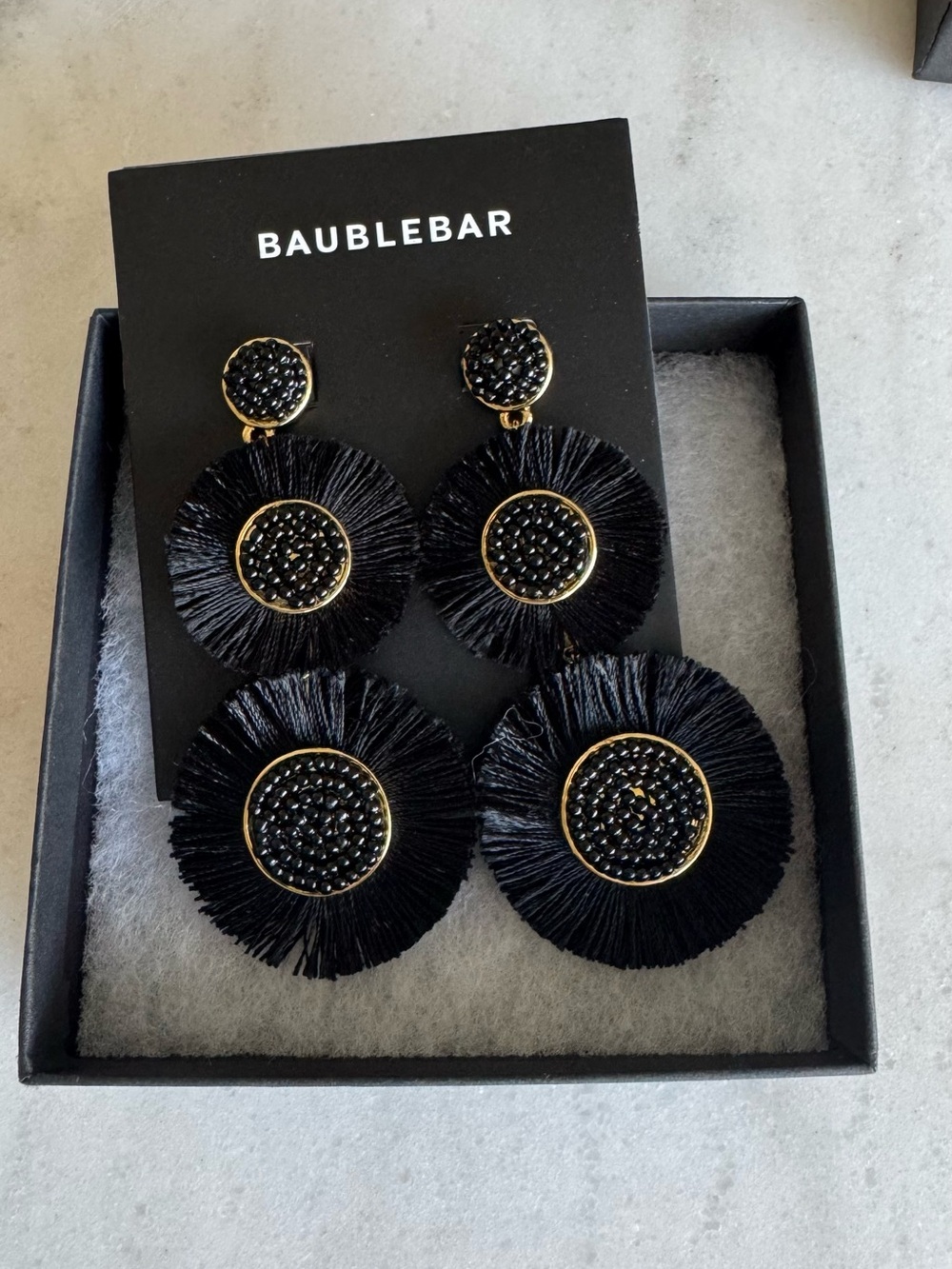 BaubleBar Black and Gold Tassel Disc Drop Earrings